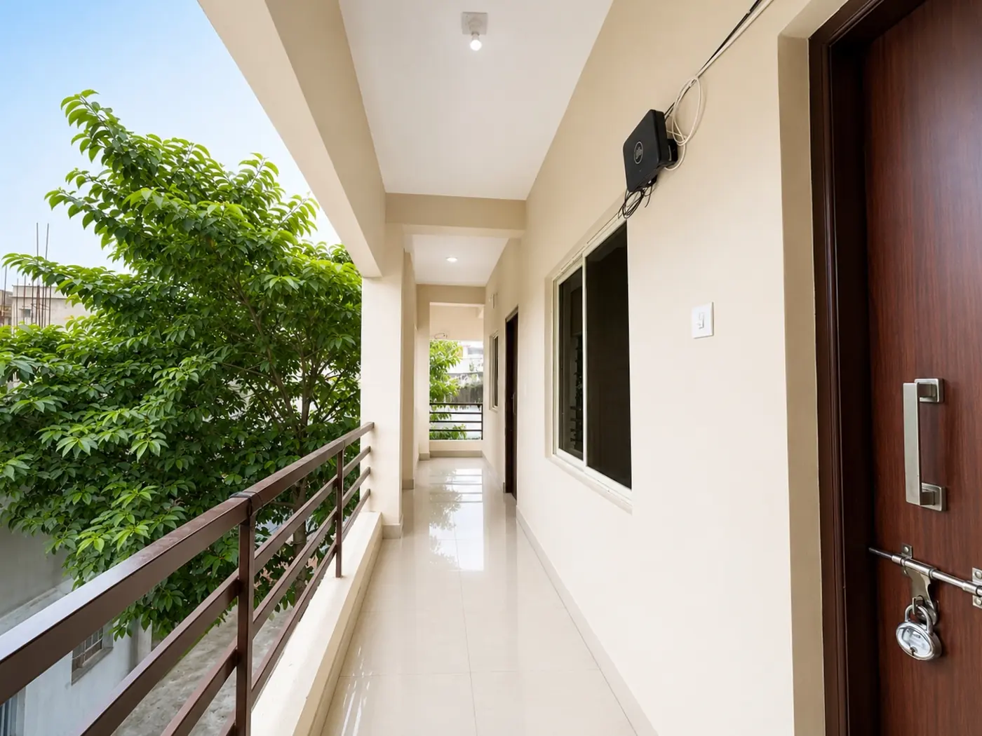 Open corridor with greenery at Yostel Venus