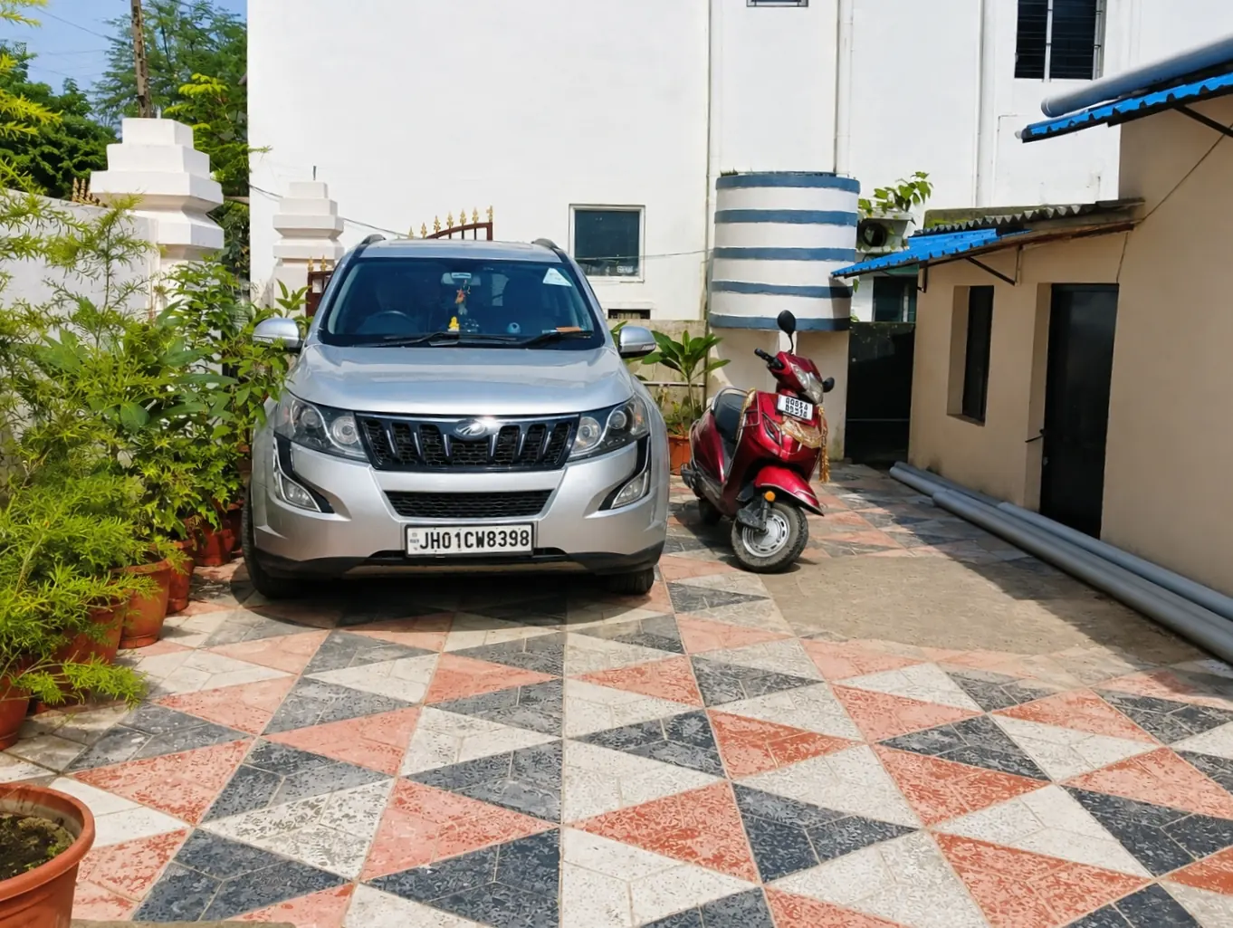 Covered parking area at Yostel Venus